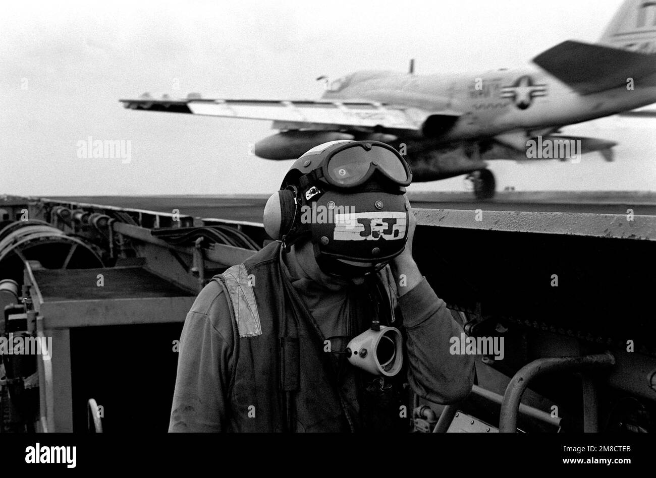 Aviation Boatswain's Mate E (Launching and Recovery Equipment) 2nd Class Joseph Wilson stands by