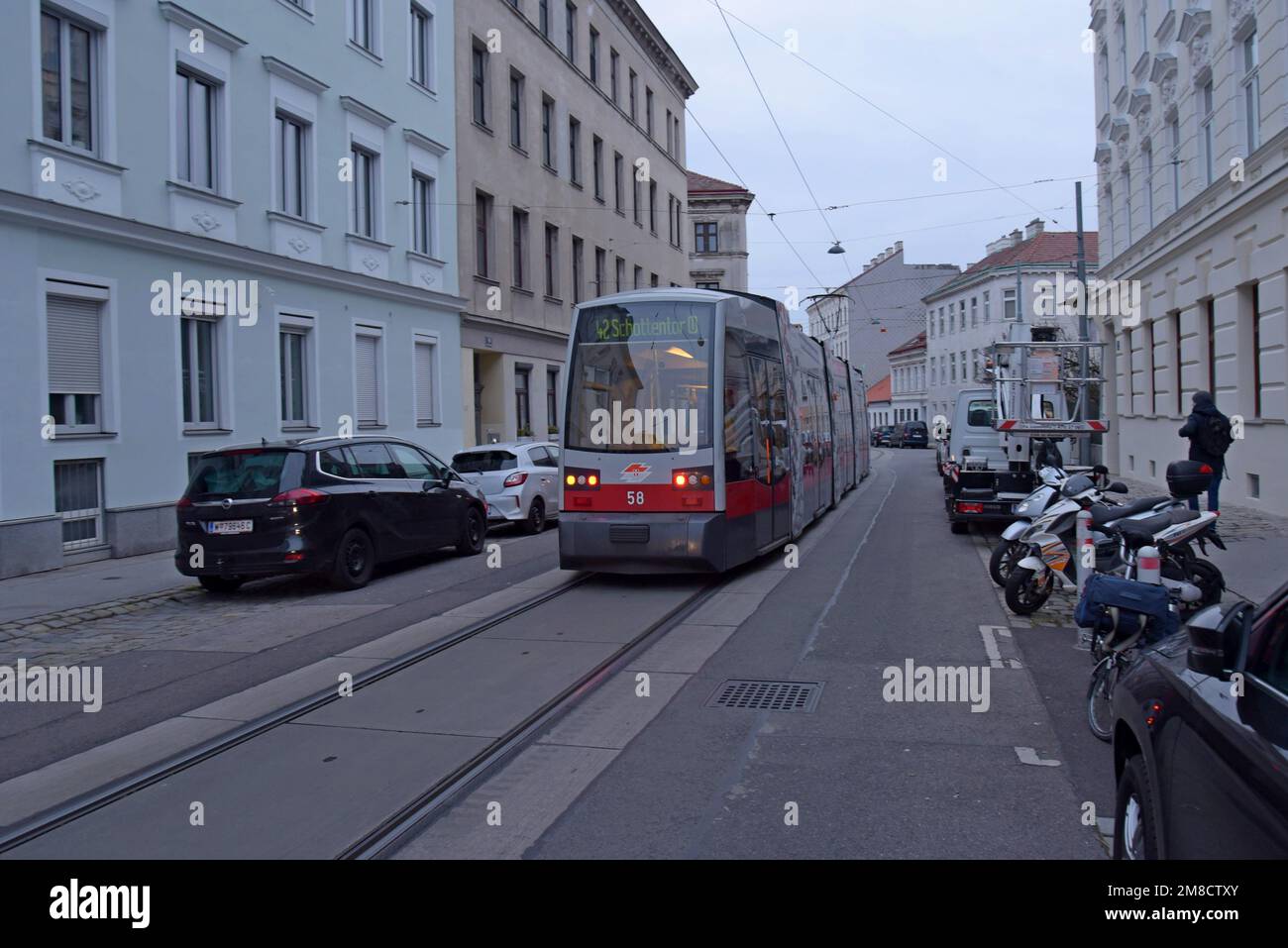 A Vienna Tram passes the apartment building used as the location for Kara Milovy's apartment in James Bond 007 film The Living Daylights Stock Photo