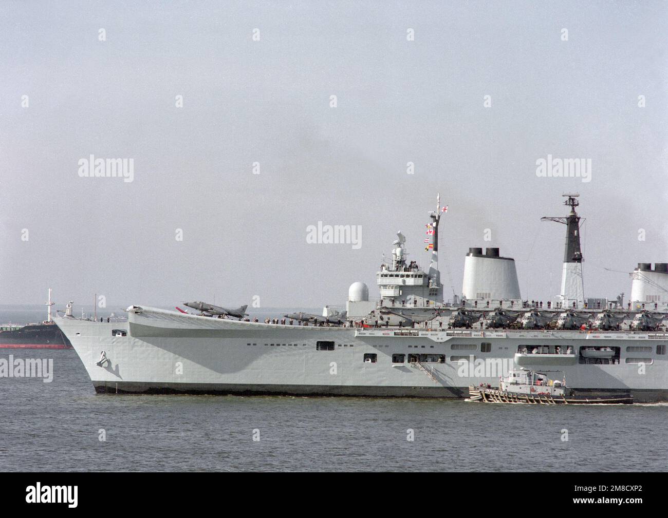 The large harbor tug Dahlonega (YTB770) the British light
