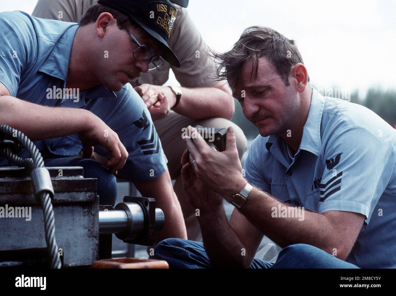 Aviation Boatswain's Mate E (Launching and Recovery Equipment) 1ST Class Kevin Hopkins performs