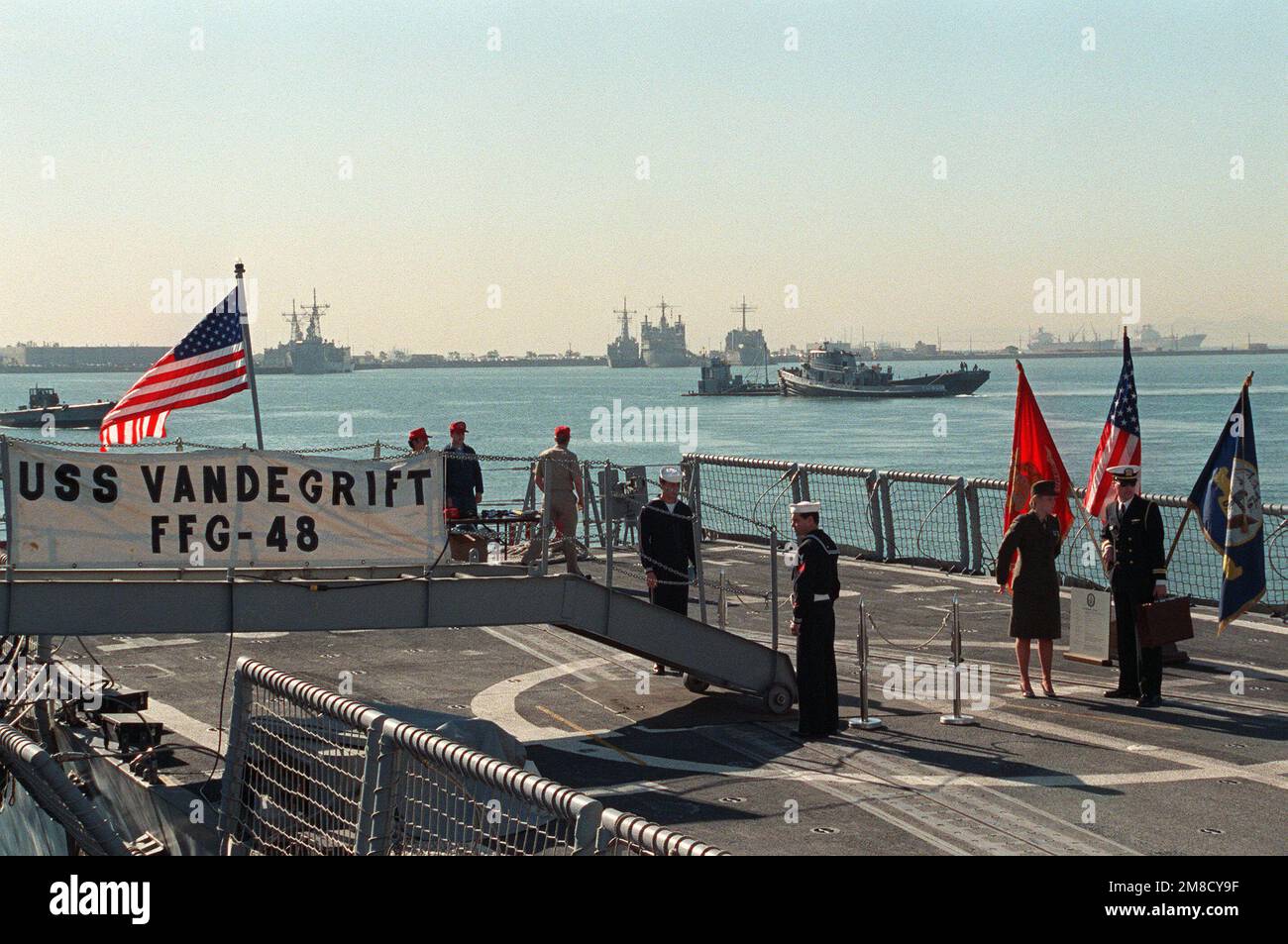 A banner bedecks the gangplank of the guided missile frigate USS VANDEGRIFT (FFG48) during a