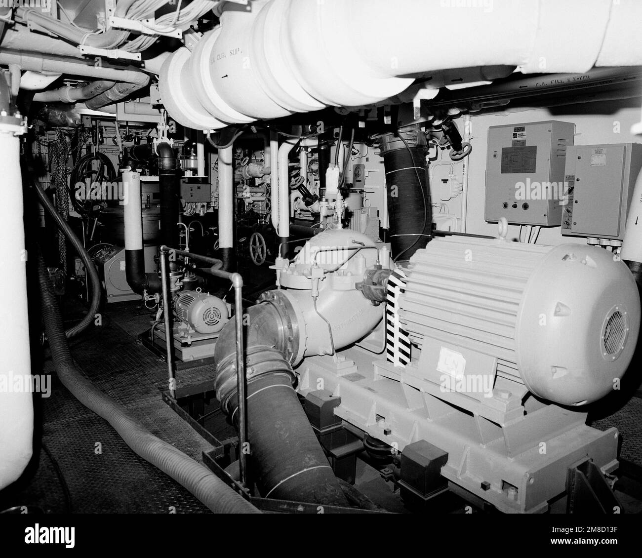 A view of auxiliary machinery room No. 1 aboard the guided missile cruiser COWPENS (CG63). The
