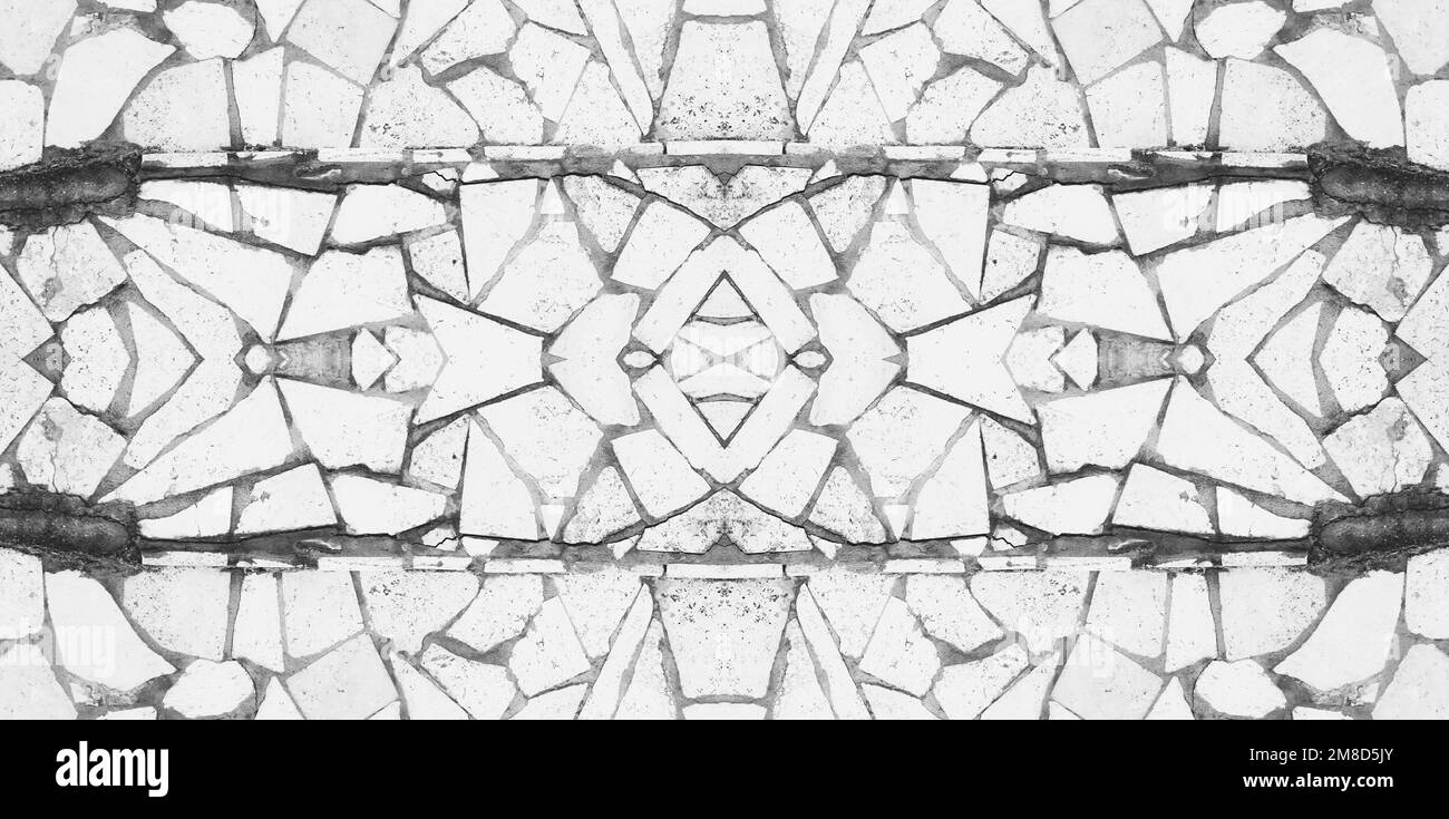 Broken Tiles Mosaic Pattern. Tile wall high quality photo. Interior background. Tiled Wall. Symmetrical Banner. Black and white. Monotone Stock Photo