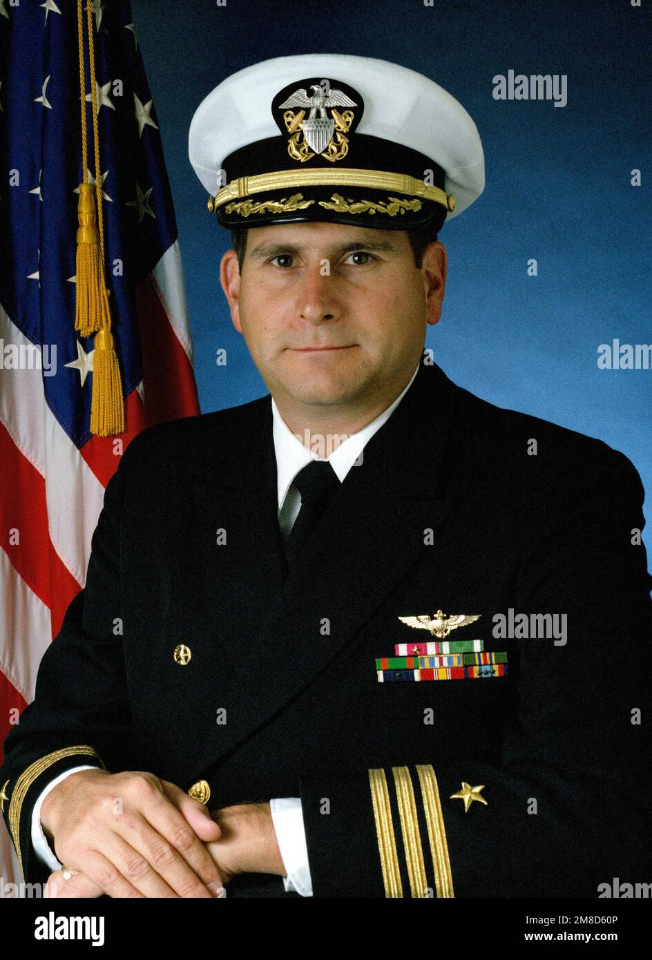 Commander James A. Robb, USN (covered). Country: Unknown Stock Photo