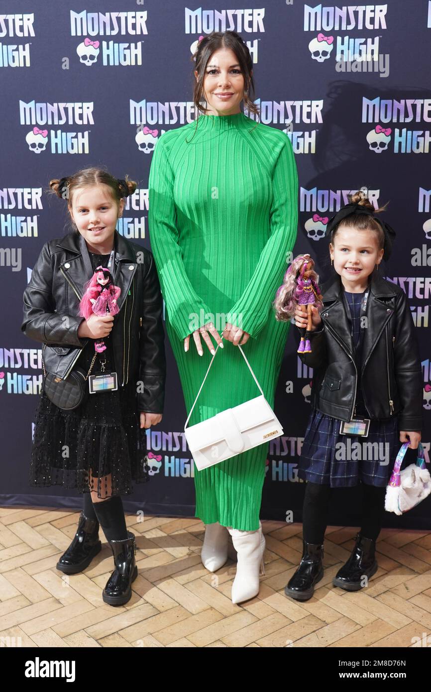 Imogen Thomas with her daughters Arianna (left) and Siera arrive at the