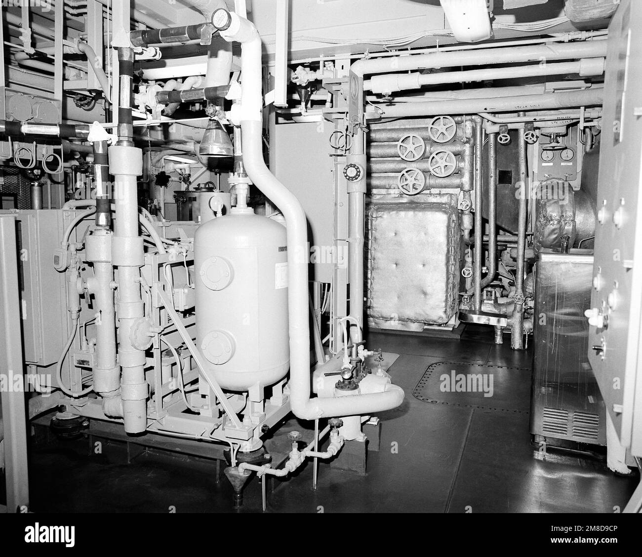 A view of main engine room No. 2 on the guided missile cruiser MONTEREY (CG 61) at completion of construction. Base: Bath State: Maine (ME) Country: United States Of America (USA) Stock Photo