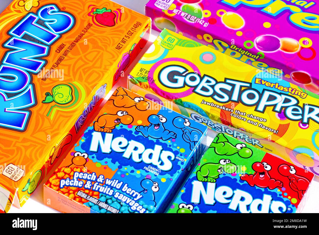 DUSHANBE, TAJIKISTAN - AUGUST 18, 2022: Different kinds of American sweet candies (Gobstopper, Spree, Runts, Nerds) packs. Stock Photo