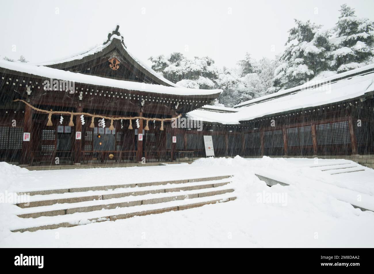 Naganokengokoku Shrine during a snowstorm in winter, Matsumoto, japan Stock Photo