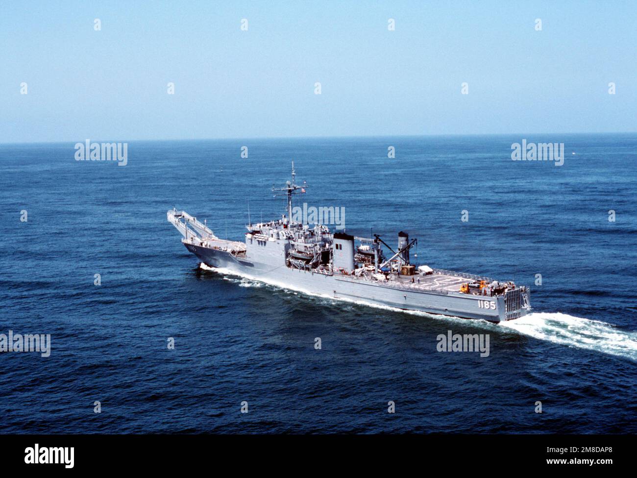 A port quarter view of the tank landing ship USS SCHENECTADY (LST1185