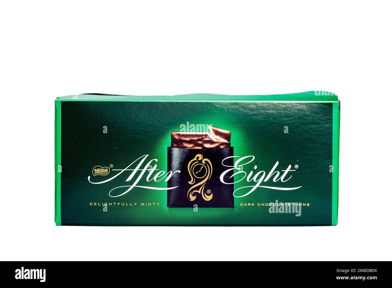 DUSHANBE, TAJIKISTAN - SEPTEMBER 12, 2022: Green box package of mint dark chocolate thins After Eight isolated on white background close up. Stock Photo