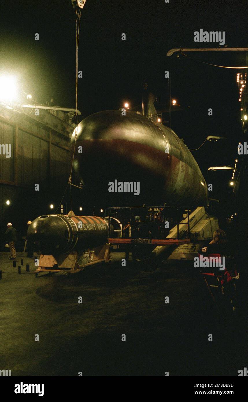 Set lights illuminate the nuclearpowered attack submarine USS PERMIT