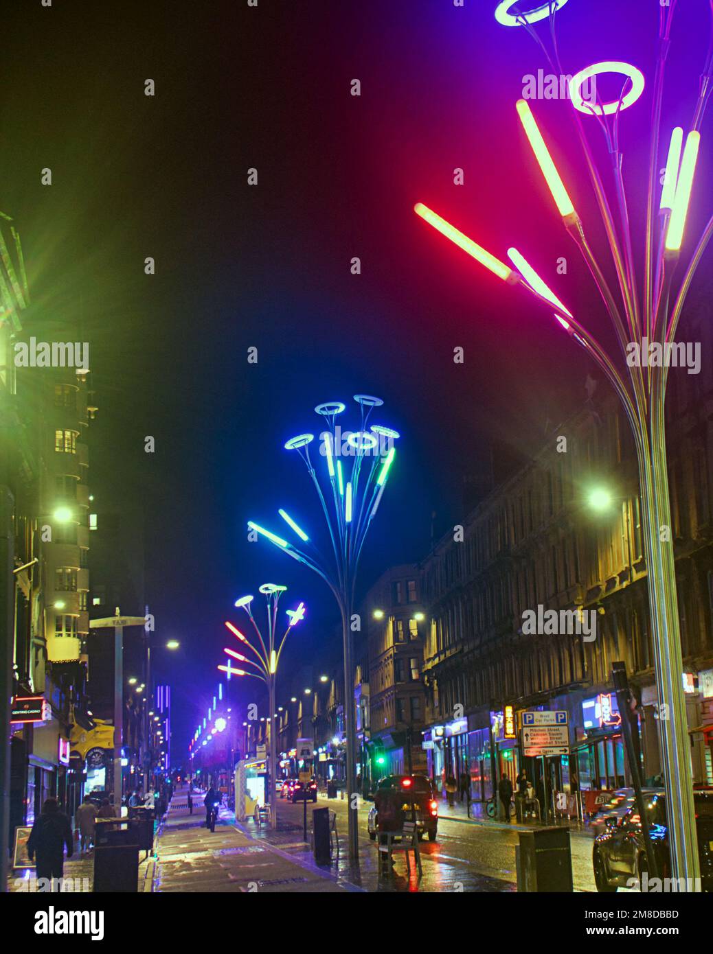 Glasgow, Scotland, UK 13th January, 2023. UK Weather: Newly revamped and decorated  sauchiehall street with its  new cycle lane year round lights  Wet and windy saw  late night shopping in sauchiehall street in the city centre. Credit Gerard Ferry/Alamy Live News Stock Photo