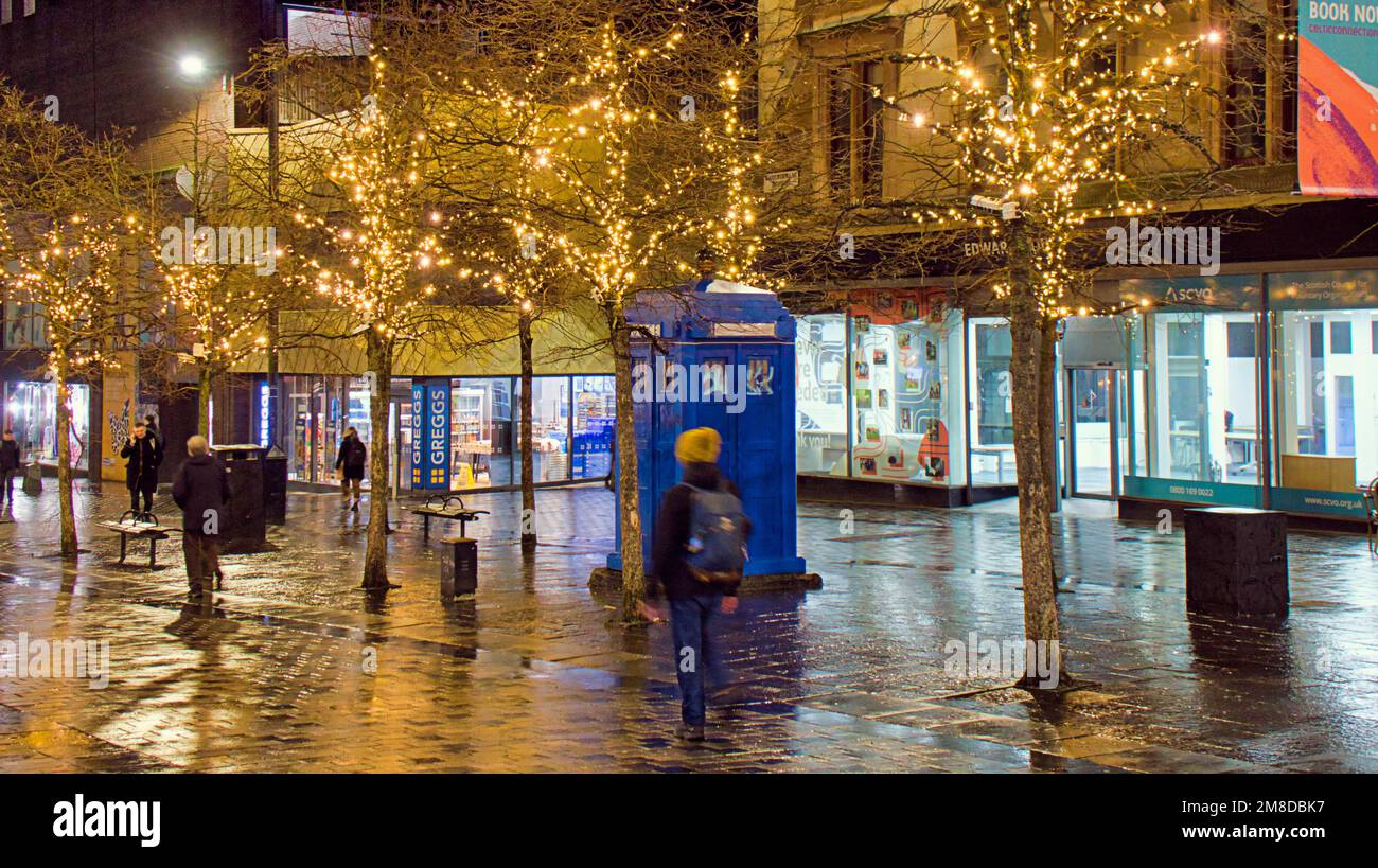 Glasgow, Scotland, UK 13th January, 2023. UK Weather: Newly revamped and decorated  sauchiehall street with its  new cycle lane year round lights  Wet and windy saw  late night shopping in sauchiehall street in the city centre. Credit Gerard Ferry/Alamy Live News Stock Photo