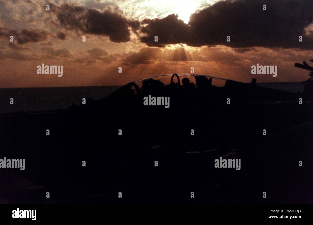 The pilot and radar intercept officer (RIO) aboard an F14A Tomcat