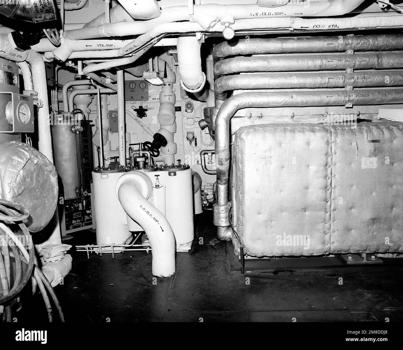 A view of main engine room No. 1 aboard the guided missile cruiser COWPENS (CG-63). The COWPENS is 90 percent complete. Base: Bath State: Maine (ME) Country: United States Of America (USA) Stock Photo