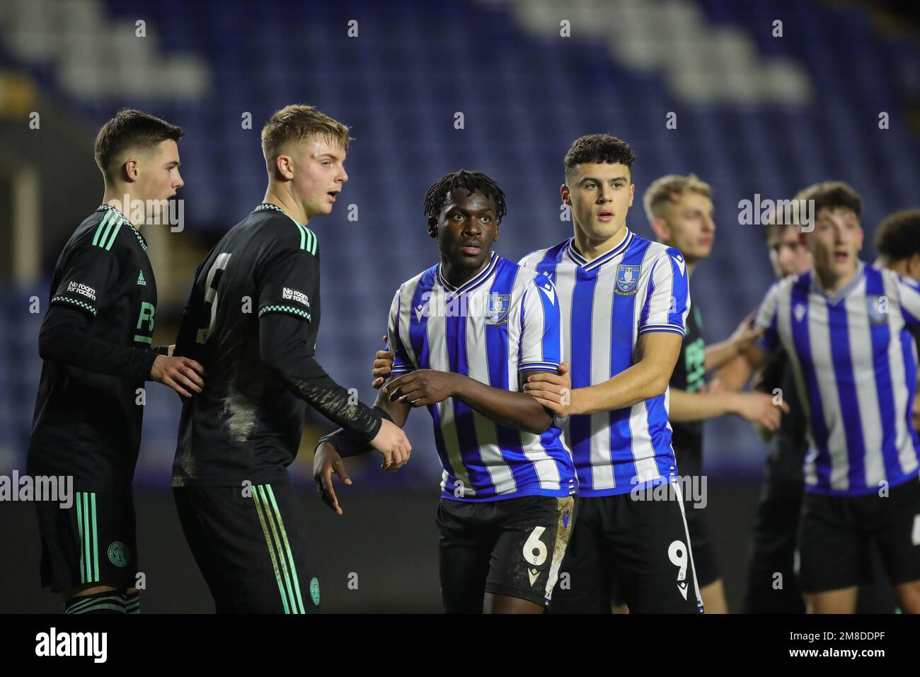 Tafadzwa Tapudzai 6 of Sheffield Wednesday and BaileyTye Cadamarteri