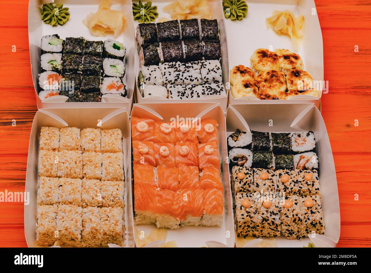 Food delivery Japanese cuisine. Various rolls in boxes Stock Photo Alamy