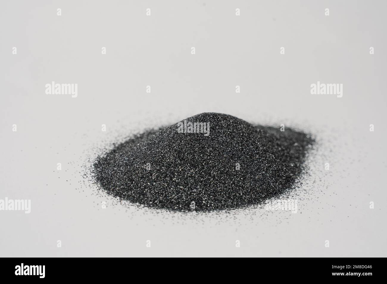 Silicon carbide abrasive powder for leveling stones isolated on white