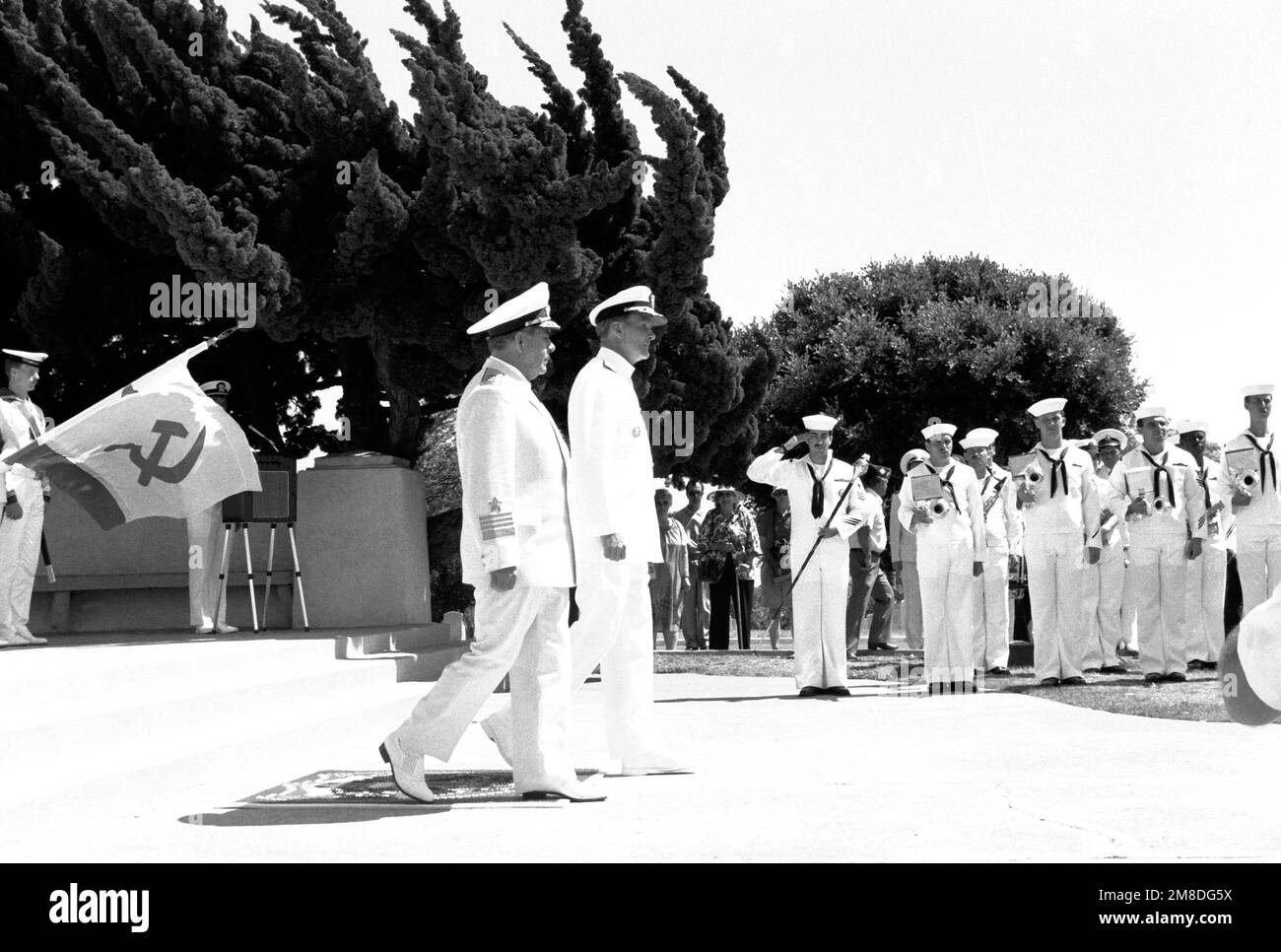 ADM Gennadiy Khvatov, left, commander, Soviet Pacific Fleet, and ADM Charles R. Larson, commander in chief, U.S. Pacific Fleet, take part in a wreath-laying ceremony at Fort Rosecrans National Cemetery. The ceremony is being held to honor those members of the U.S. Merchant Marine who died while delivering supplies to the Soviet Union during World War II. Three ships of the Soviet Pacific Fleet are in San Diego for a five-day goodwill visit. Base: San Diego State: California (CA) Country: United States Of America (USA) Stock Photo