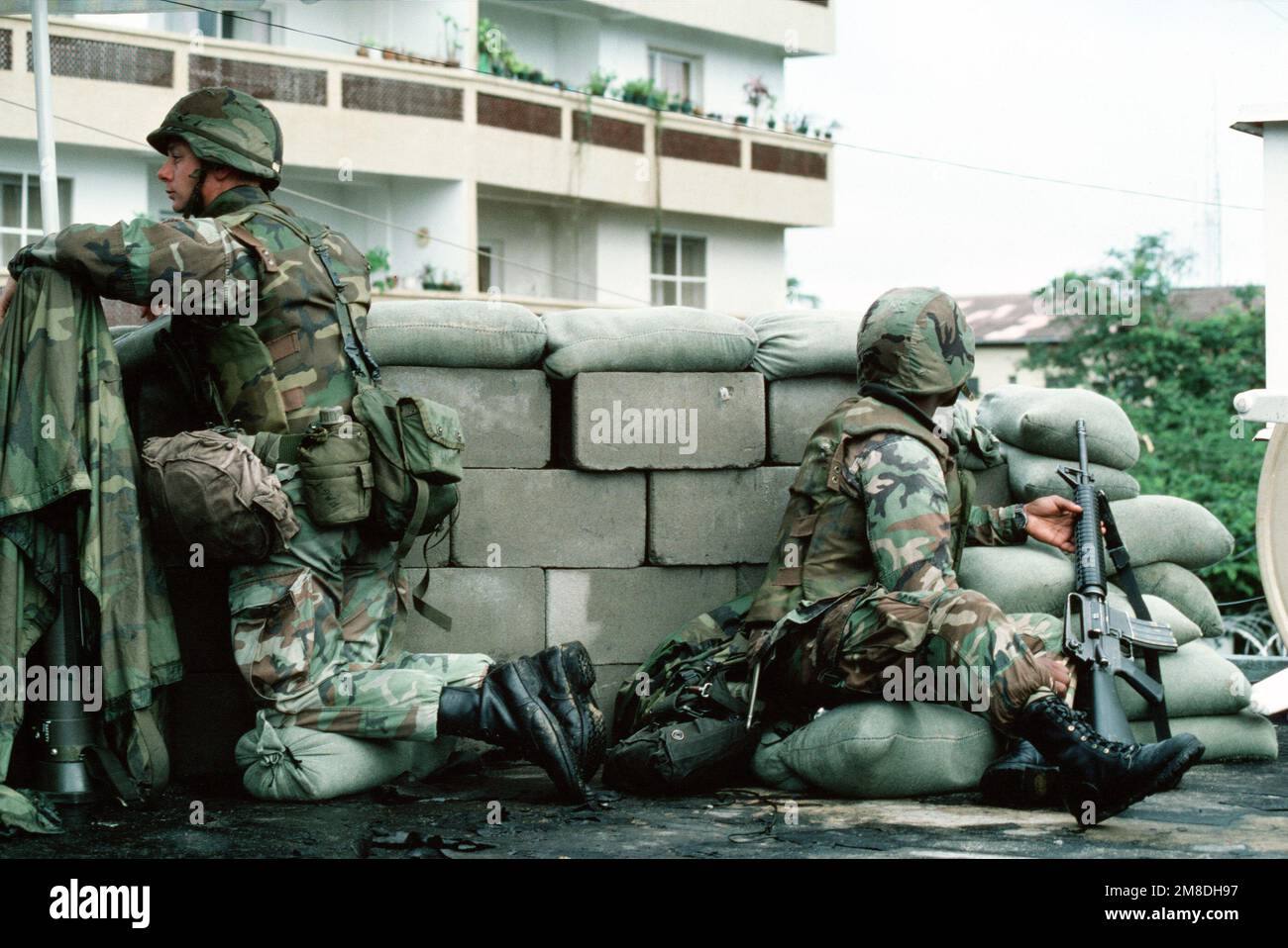 Two Marines man a security post on the roof of the US Embassy. The ...