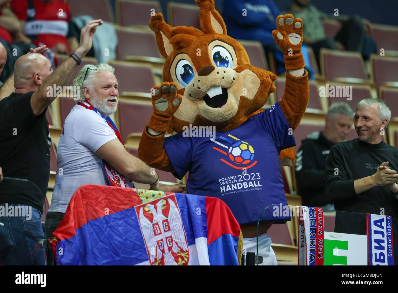 Kattowitz, Poland. 13th Jan, 2023. Handball: World Cup, Serbia - Algeria, preliminary round, Group E, 1st match day at Spodek Katowice. Squirrel Pax, the mascot of the World Cup, dances with Serbian fans in the stands. Credit: Jan Woitas/dpa/Alamy Live News Stock Photo