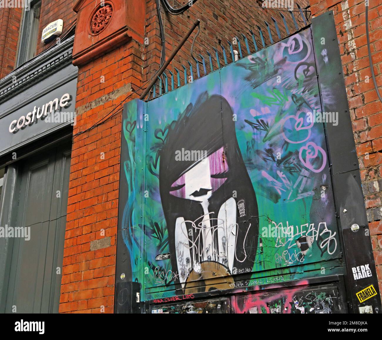 Costume, sad woman in a spray paint artwork, Dublin city centre, Eire, Ireland Stock Photo