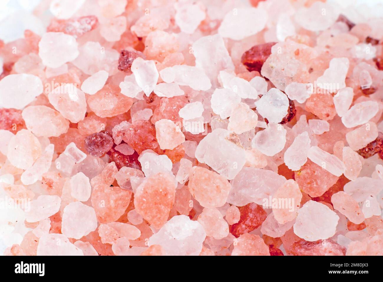 Pink Himalayan salt crystals texture close up. Stock Photo