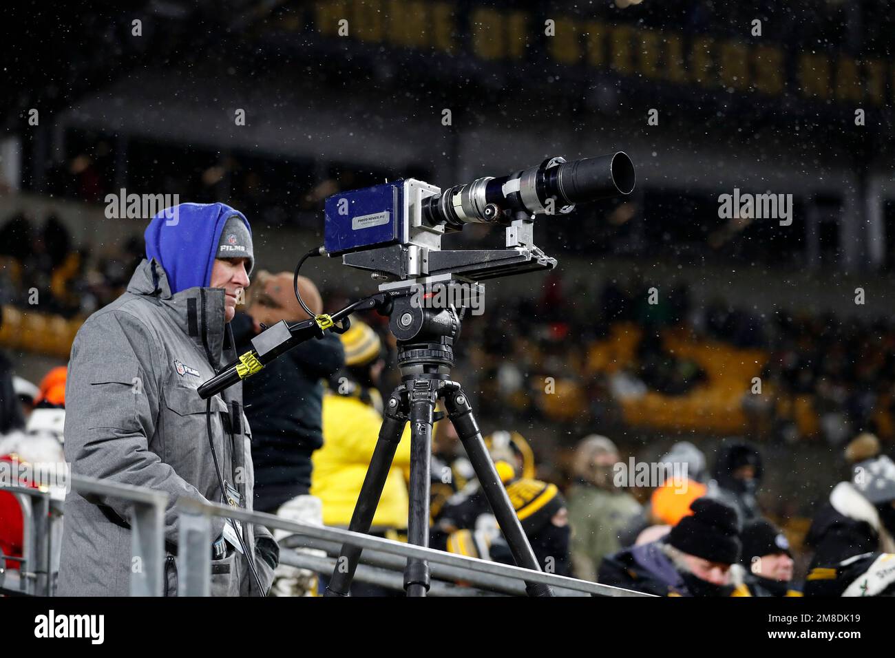 An original camera used at the 1972 Immaculate Reception is operated by NFL  Films cinematographer Hank McElwee on the 50th Anniversary of the Immaculate  Reception during an NFL football game between the
