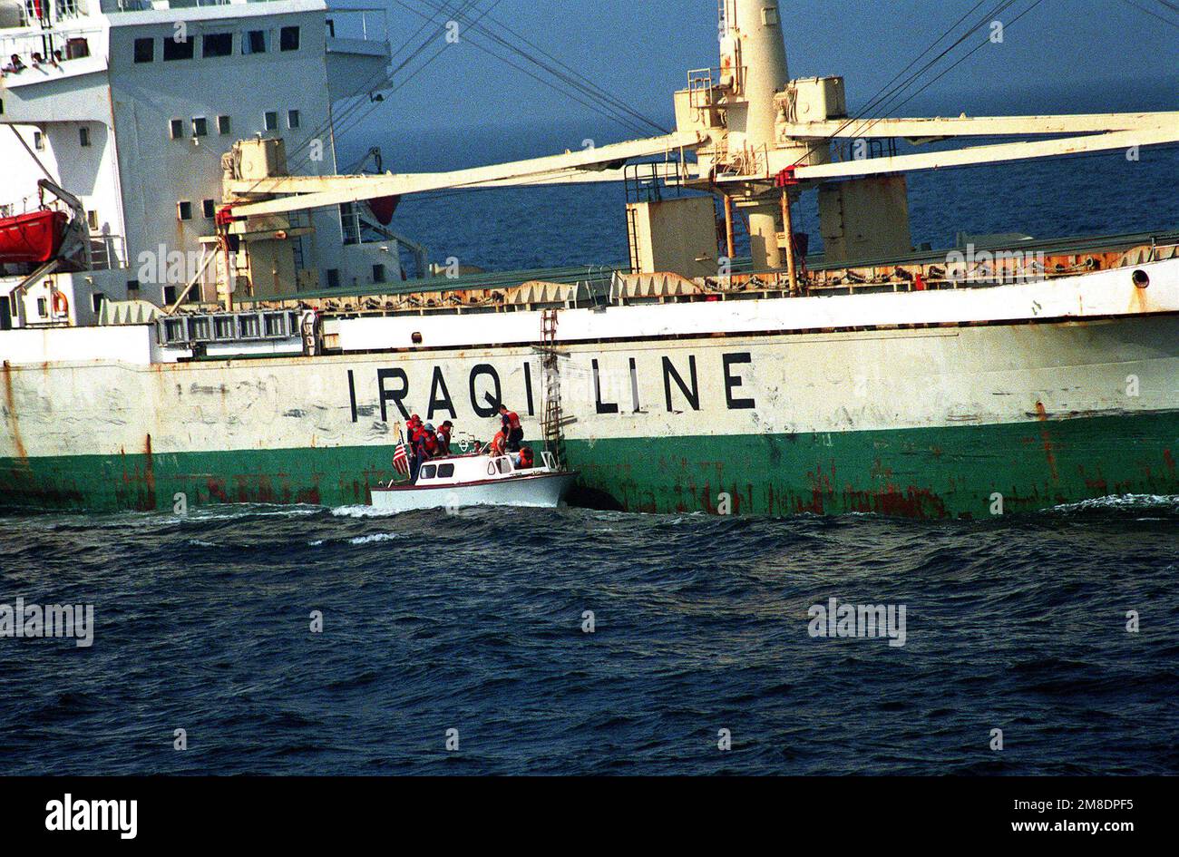 Members of a boarding team from the guided missile destroyer USS GOLDSBOROUGH (DDG20) take
