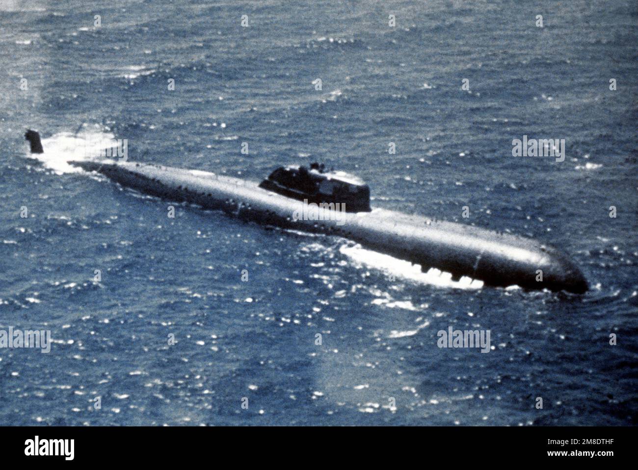 An aerial starboard beam view of a Soviet Victor I class nuclear-powered attack submarine underway. Country: Unknown Stock Photo