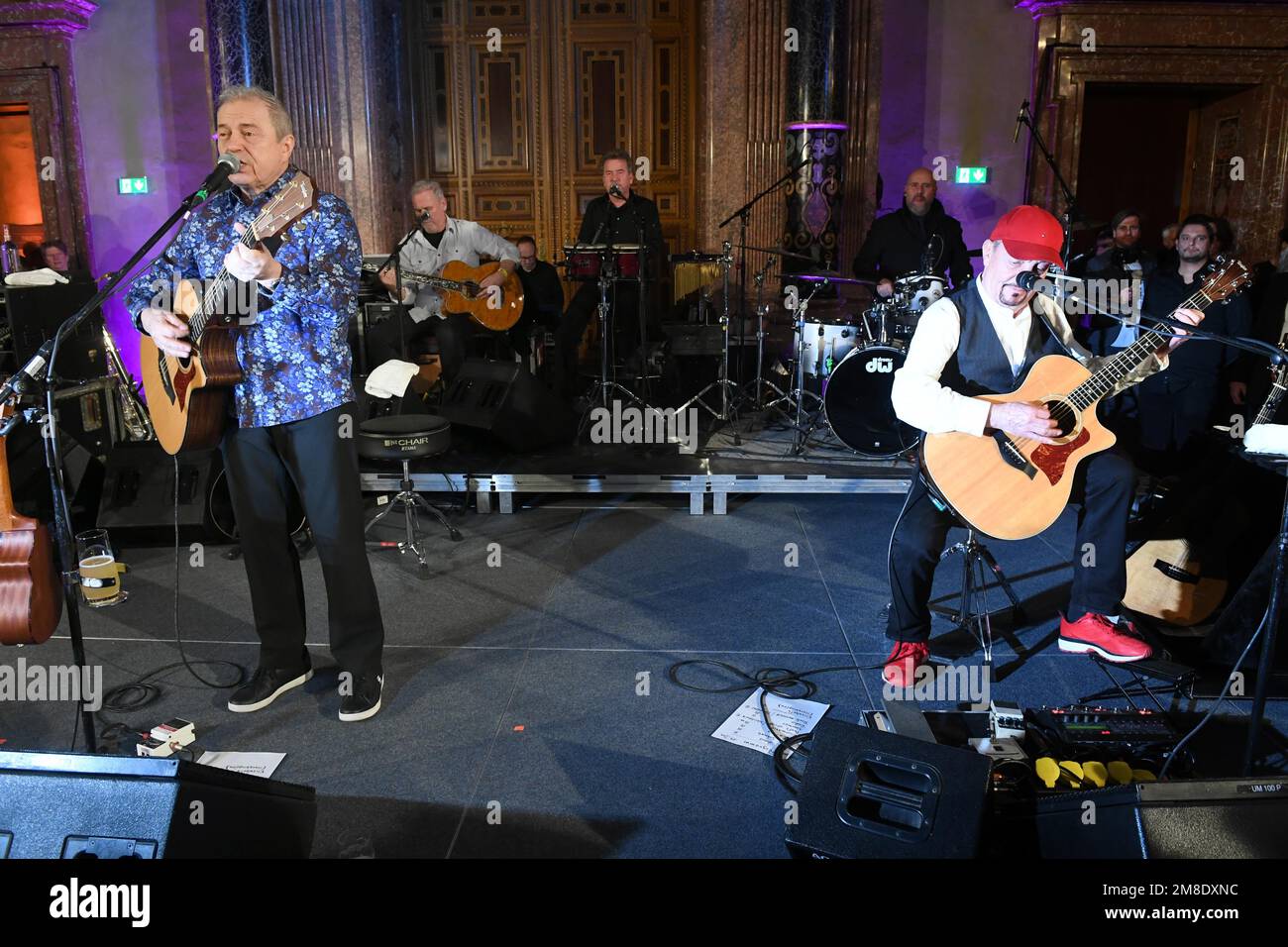 Munich, Germany. 13th Jan, 2023. The Spider Murphy Gang, Günther Sigl (l) and Barny Murphy (r) perform at the New Year's reception of the Bavarian Minister President in the Munich Residence. Credit: Felix Hörhager/dpa/Alamy Live News Stock Photo