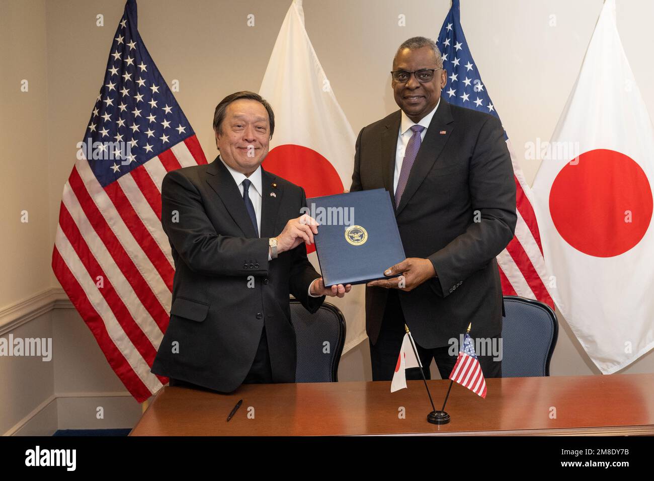 Washington, United States Of America. 12th Jan, 2023. Washington, United States of America. 12 January, 2023. U.S Secretary of Defense Lloyd Austin, right, and Japanese Defense Minister Yasukazu Hamada hold up their signed agreement following bilateral discussions at the Pentagon, January 12, 2023 in Washington, DC Credit: TSgt. Jack Sanders/DOD Photo/Alamy Live News Stock Photo