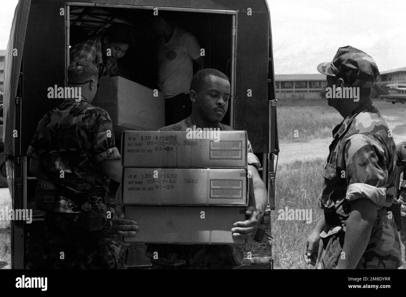 United States Marines bring in supplies during rescue and recovery