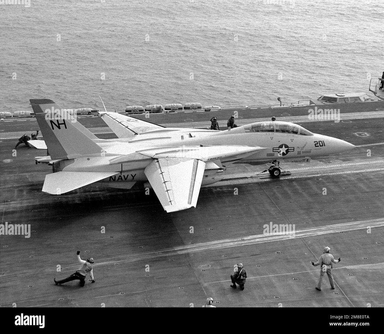 A Fighter Squadron 213 (VF213) F14A Tomcat aircraft stands ready for