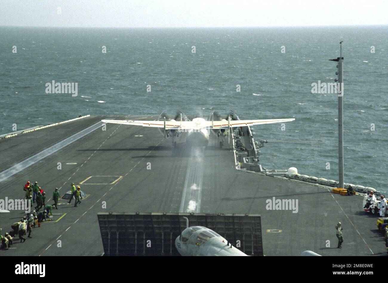 A Fleet Logistic Support Squadron 30 (VRC-30) C-2A Greyhound aircraft is launched from the No. 1 catapult on the flight deck of the nuclear-powered aircraft carrier USS ABRAHAM LINCOLN (CVN-72). The LINCOLN is underway off the coast of Argentina. Country: Atlantic Ocean (AOC) Stock Photo