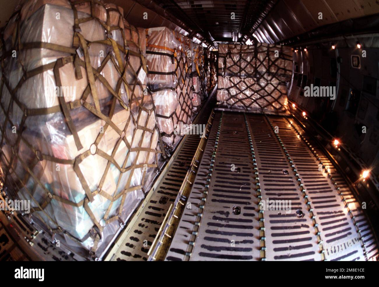 Pallets of donated medical supplies sit aboard a 60th Military Airlift Wing C-5B Galaxy aircraft. The supplies will be flown to Prague, Czechoslovakia, where they will be turned over to the Czech government for distribution. Base: Rhein-Main Air Base Country: Deutschland / Germany(DEU) Stock Photo