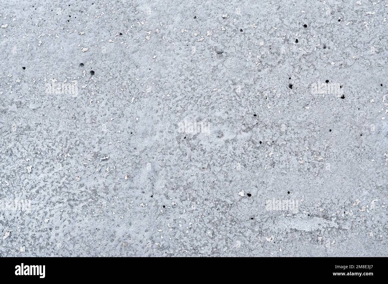 Natural gray grunge cement wall texture. Can be used as an abstract background with copy space. Stock Photo