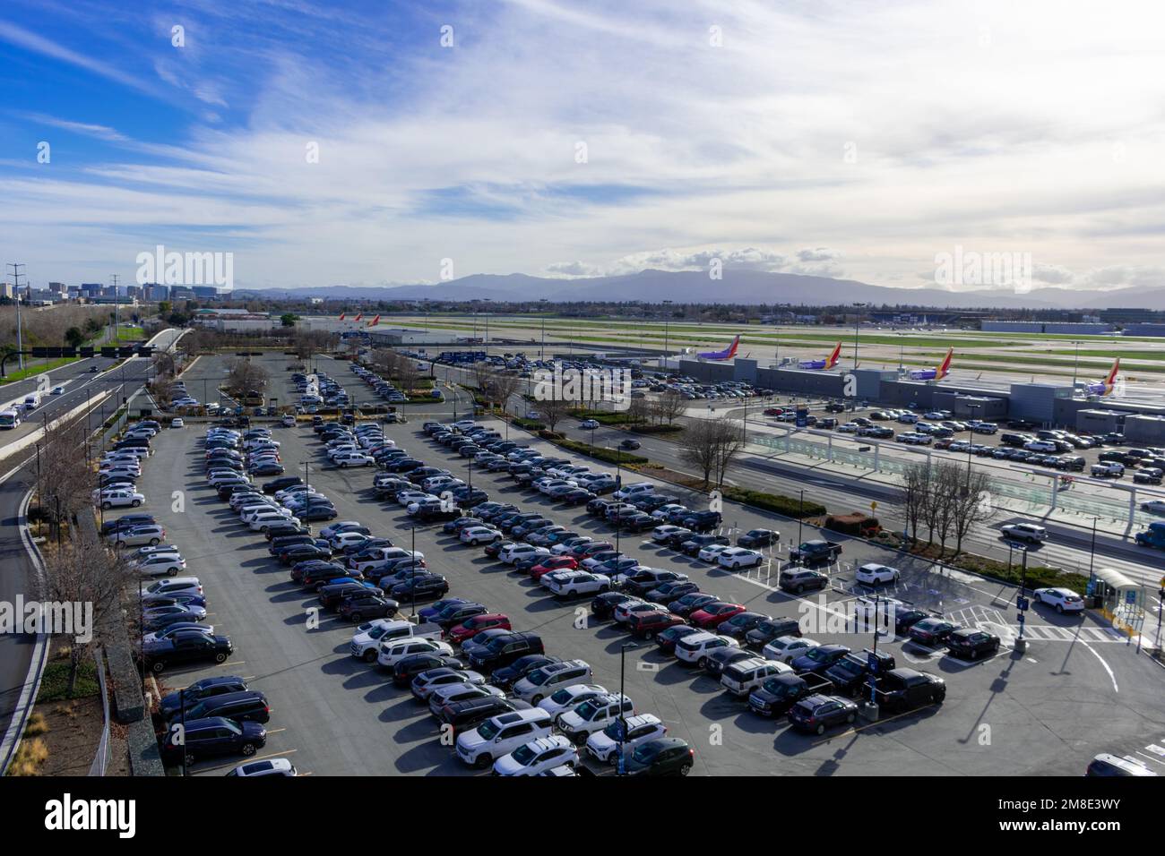 Aerial view of car parking lot and airfield of San Jose Mineta ...
