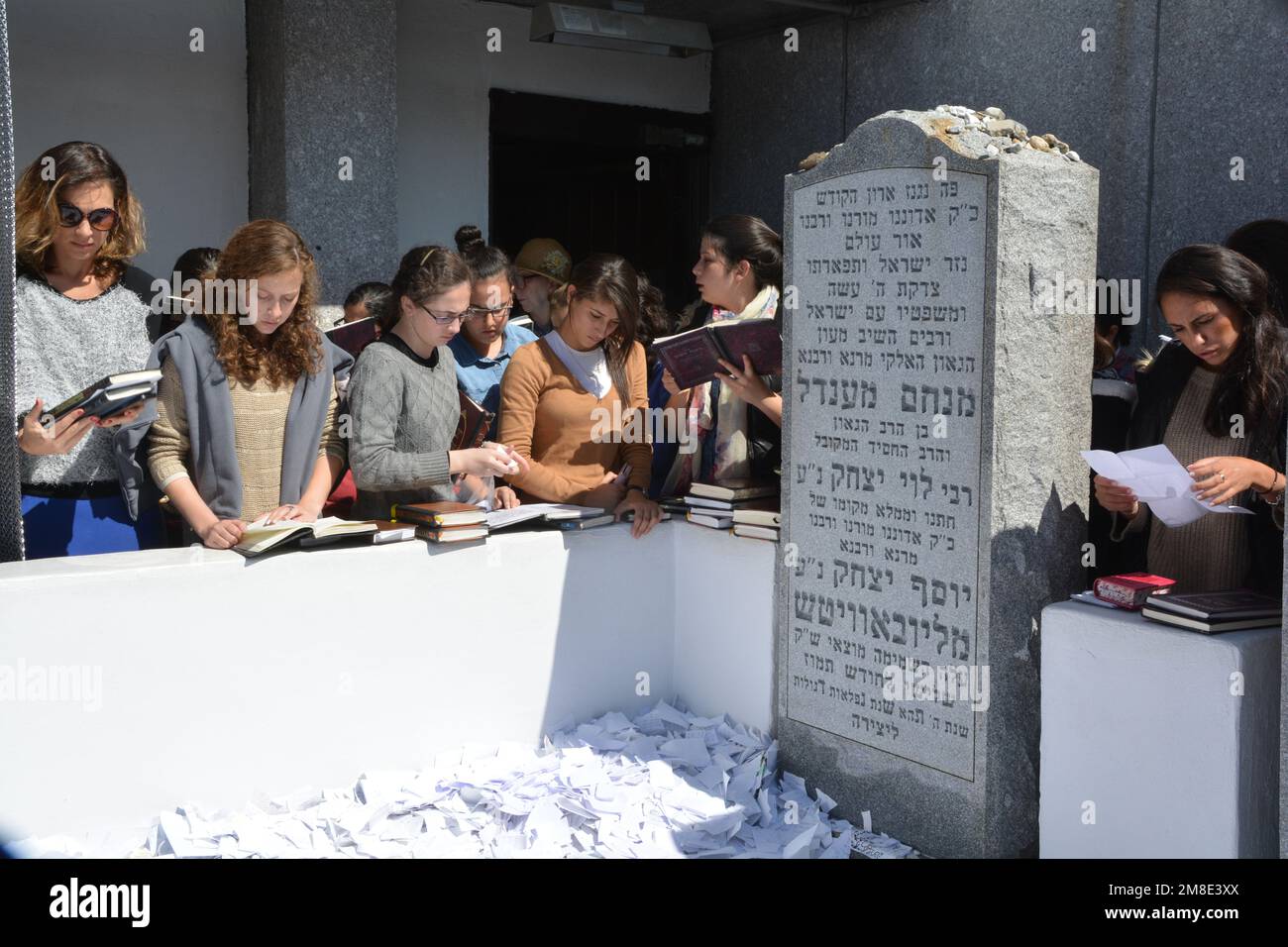 Orthodox jewish women recite personal prayers at the Ohel, the burial place of the Lubavitcher Rebbe. In Cambria Heights, Queens, New York City. Stock Photo