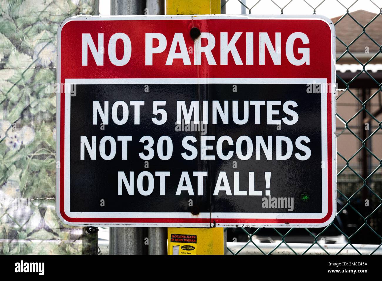 An emphatic no parking sign on Northern Boulevard  in Flushing, Queens, New York. Stock Photo
