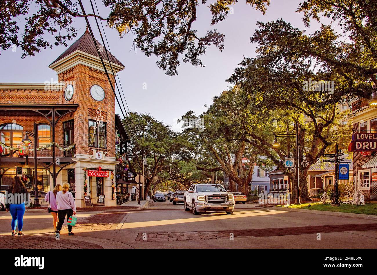 Shoppers stroll down Washington Avenue, Dec. 28, 2022, in Ocean Springs
