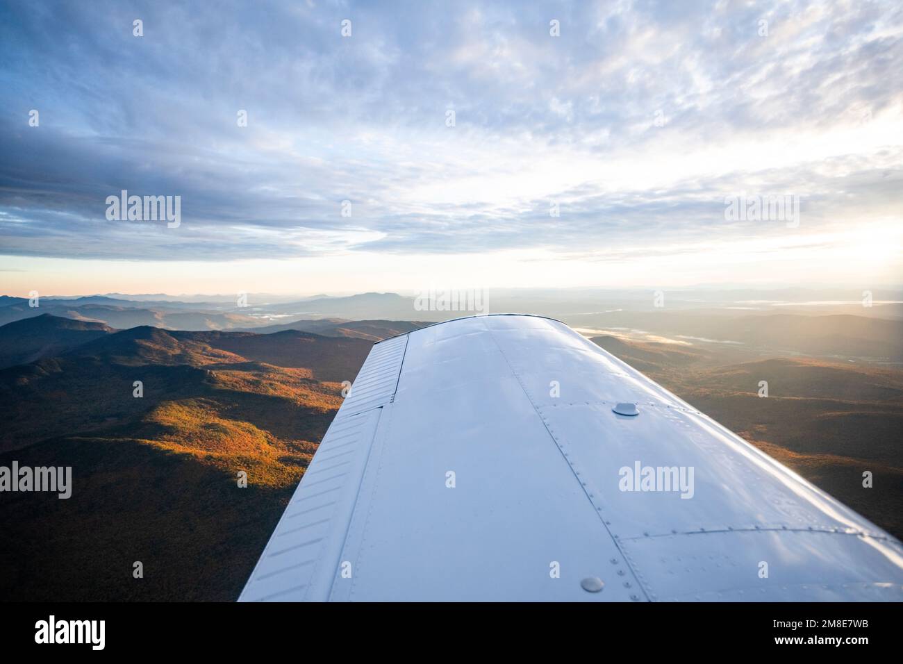 Sunrise flight over Vermont as seen by small airplane Stock Photo