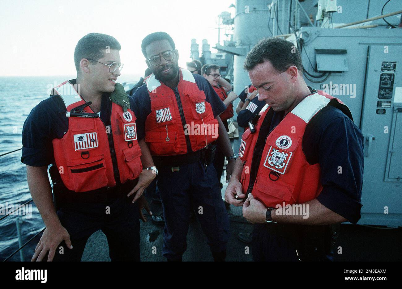 GUNNER's Mate 3rd Class Matthew Groenewold, Boatswain's Mate 1ST Class Glenn T. Wade and