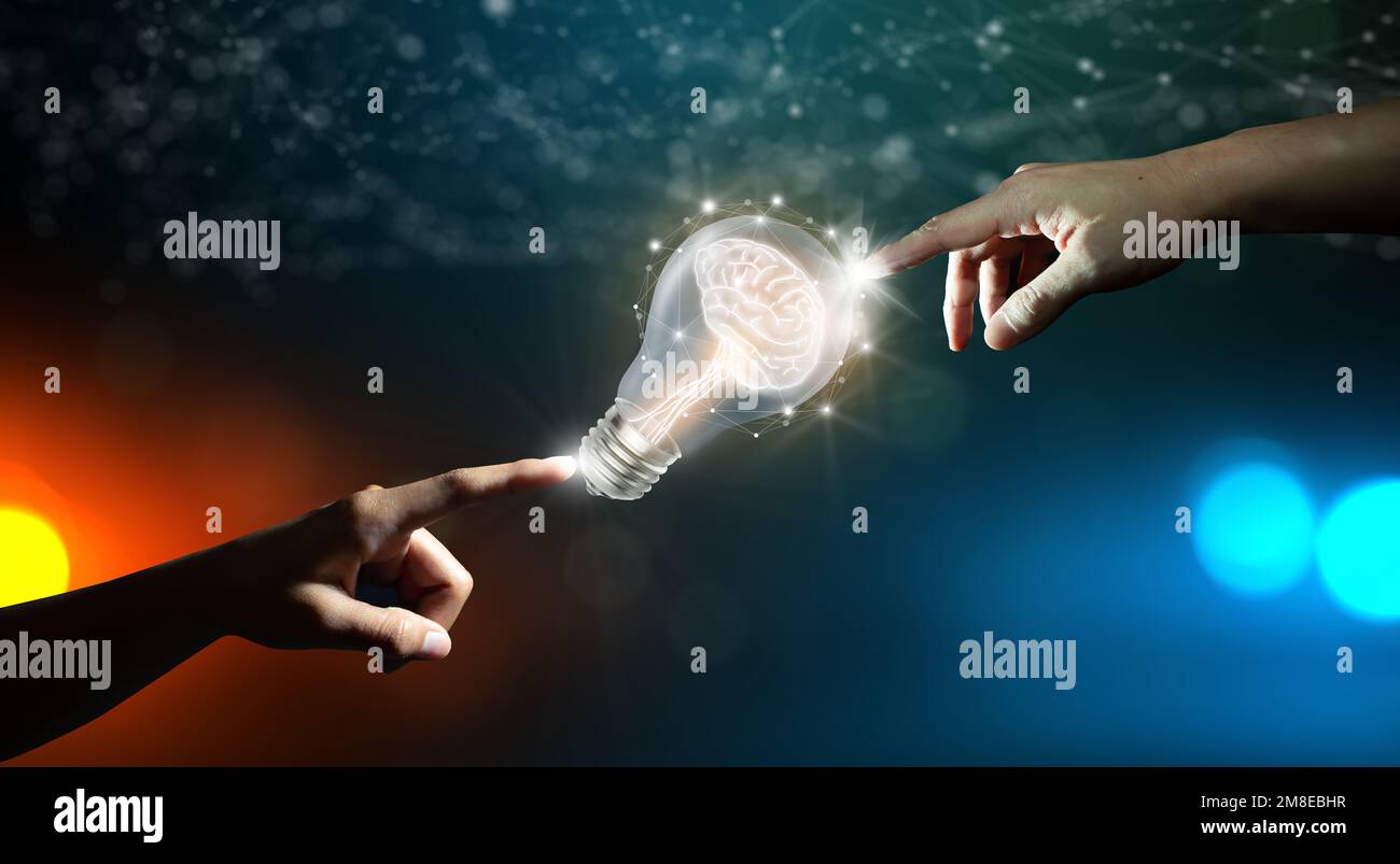 Hands pointing Light bulbs with Brain inside and Low poly wireframe outside. Creative and innovation inspiration. Business Bright idea concept. Stock Photo