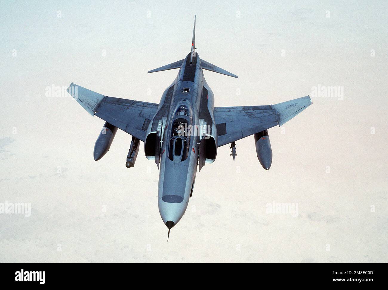 A 35th Tactical Fighter Wing F4E Phantom II aircraft passes over the