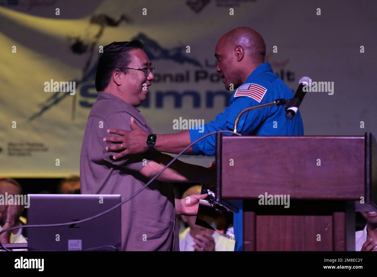 US Navy Captain and NASA astronaut Victor Glover (right) shakes hands with Brian Yokoyama during the opening session of the UCS Spirit National Pole V Stock Photo