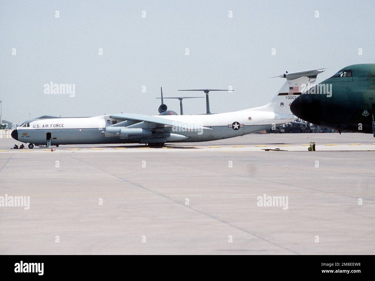 A Military Airlift Command C-141B Starlifter aircraft is parked on the ...