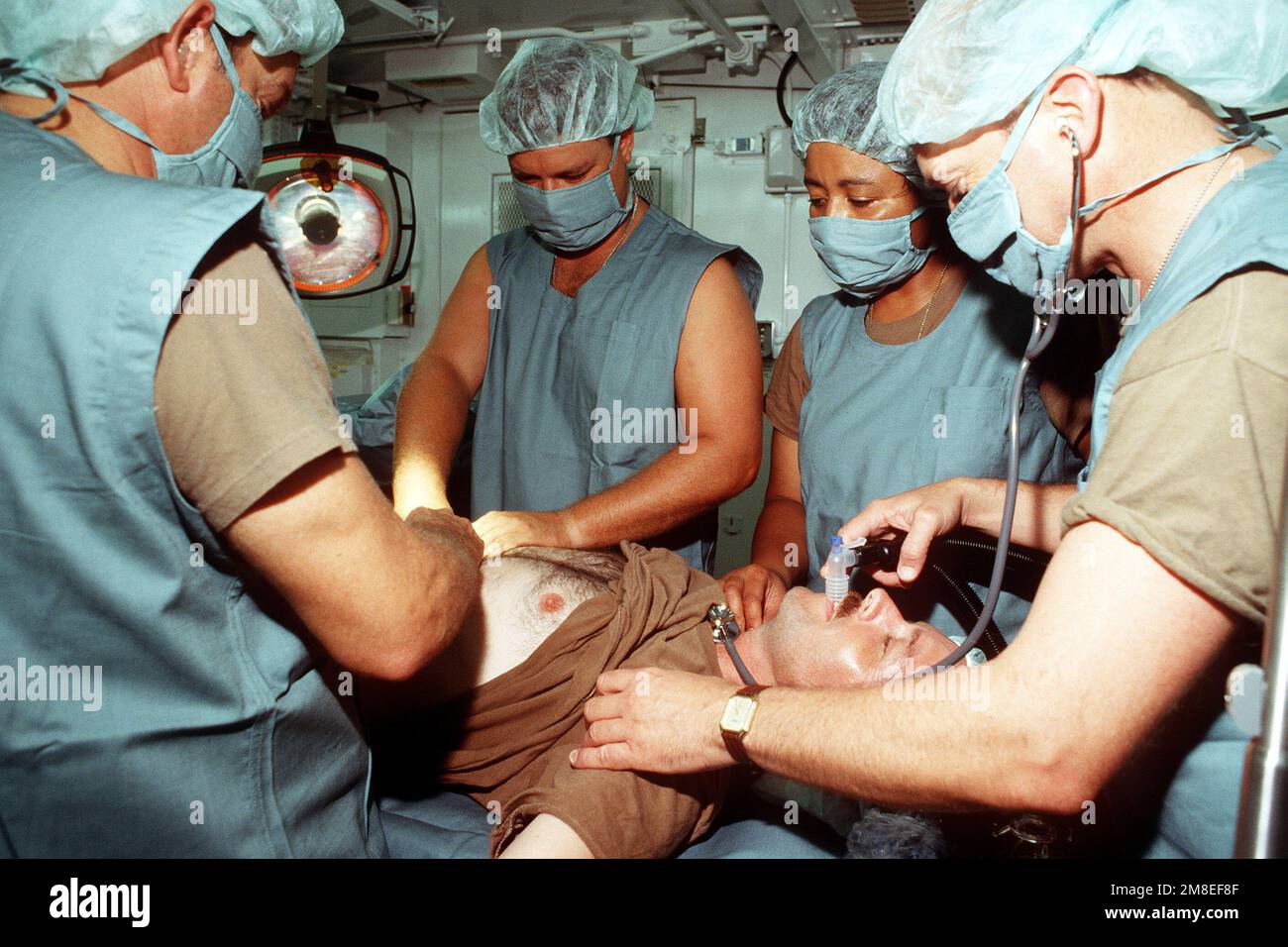 A surgical team from the 325th Medical Group practices a procedure ...