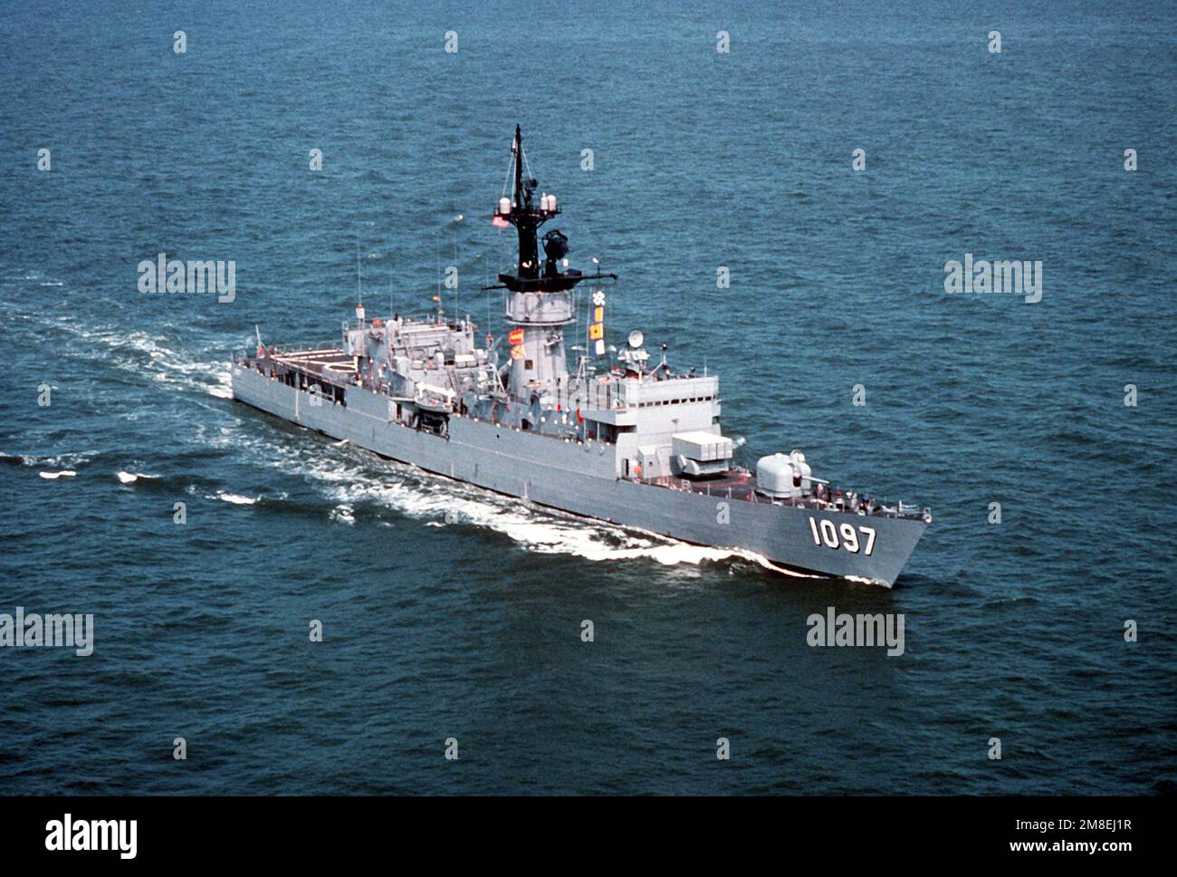A starboard bow view of the frigate USS MOINESTER (FF-1097) underway ...