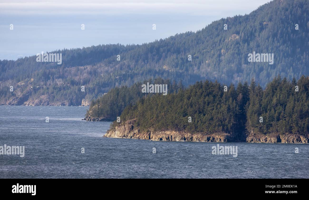 Rocky Coast of Anvil Island in Howe Sound near Vancouver, BC, Canada. Nature Background Stock Photo
